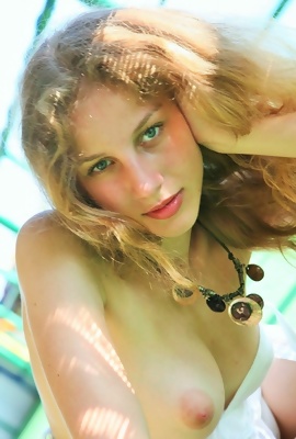 Green-eyed cutie in white summer dress