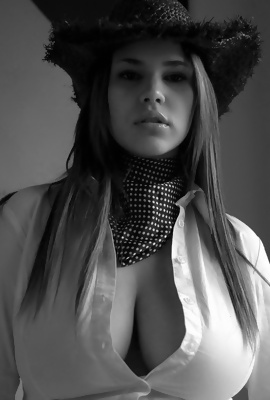 Big boobed babe Emma stripping